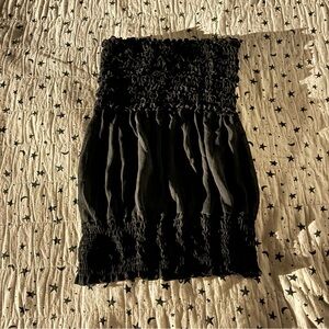 January 7 black stretchy halter top with ruching. Possibly size S.